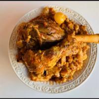 Lamb Shanks  · Over bread with soup and salad