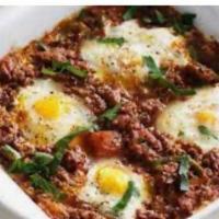 Sakshuka or مخلمة or Beef mix  · Ground Beef .onions tomato and Eggs.Bread .salad