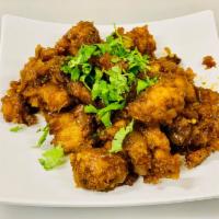 Gobi Manchurian · Indo-Chinese dish made with deep-fried crispy cauliflower tossed in manchurian sauce