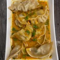 Jhol Momo (Chicken-10pcs) · Steam Chicken momo dipped in a special Himalayan soup
