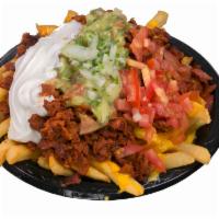 Super Fries · Fresh fries, topped with cheese, beans, your meat choice, cilantro, onions, tomatoes, guacam...