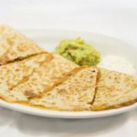 Cheese Quesadilla · Large flour tortillas, shredded Jack and cheddar cheese, sour cream, fresh guacamole.