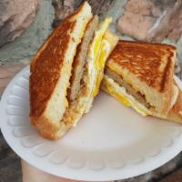 Sausage Egg and Cheese · Two Eggs sausage choice of cheese on Texas toast
