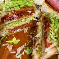 BLT Sandwiches · Classic triple decker sandwich loaded with bacon lettuce tomato and mayo.