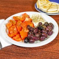 Kalamata Olives, Feta and Sliced Tomatoes · Drizzled with olive oil and oregano. Served with warm pita.