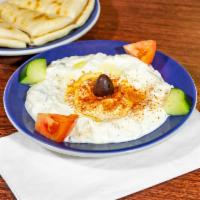 Tzatziki · Rich and creamy Greek yogurt mixed with fresh cucumbers, chopped dill, garlic and olive oil....