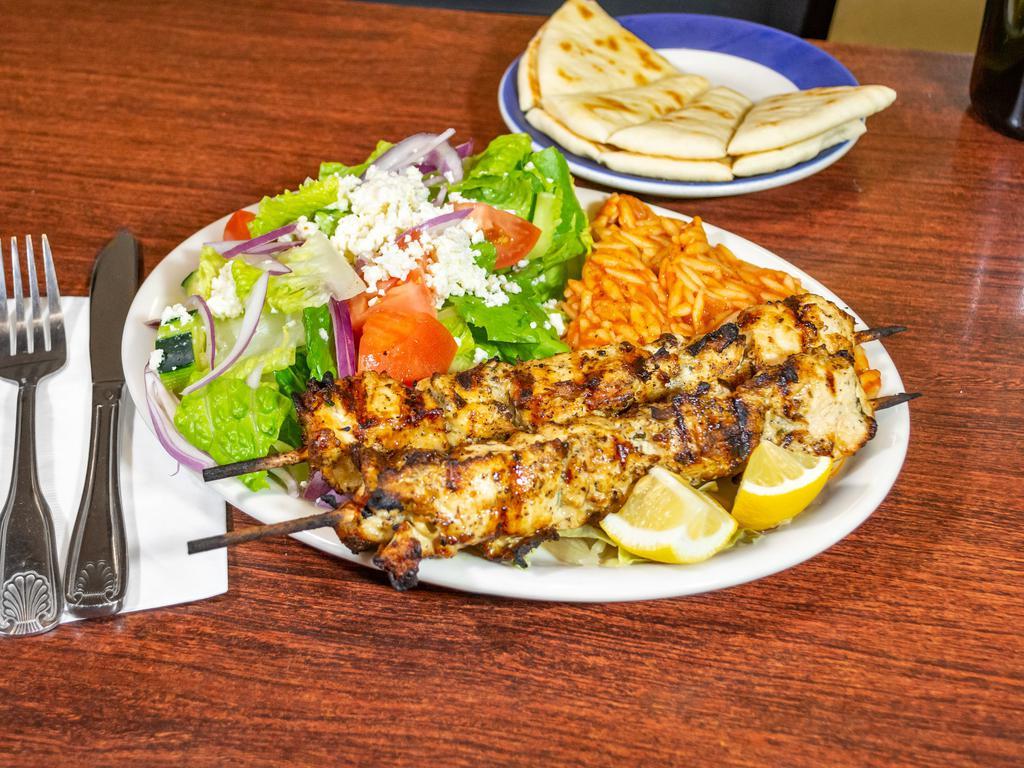 Chicken Souvlaki Plate · 2 skewers of marinated chicken breast char-broiled. Served with choice of Greek style Potatoes or Orzo AND soup or Greek Salad