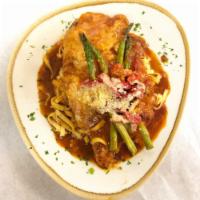 Chicken Venezia · Parmesan encrusted, asparagus tips, roasted red peppers, Madeira wine demi and fresh pasta o...