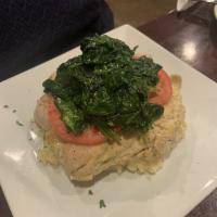 Over Chicken Florentine · Oven roasted chicken breast, fresh grilled tomato, sauteed spinach and Parmesan risotto.