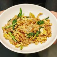 Pad See Ew · Fresh flat rice noodles, egg, Chinese broccoli, sweet onion and sweet brown sauce.