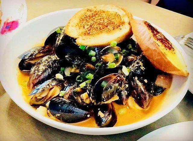 Black Mussels Curry · Red curry coconut sauce, red onion, sweet onion and garlic butter toast. Gluten free.