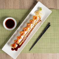 3. Boulder Roll · Tuna, salmon, yellowtail, and tempura asparagus inside with the seasoning sushi rice with so...
