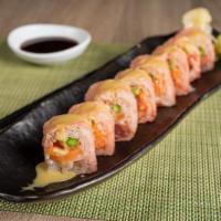 11. Magic Roll · Spicy crunch tuna inside, topped with eel salmon yellowtail and avocado, with spicy mayo, an...