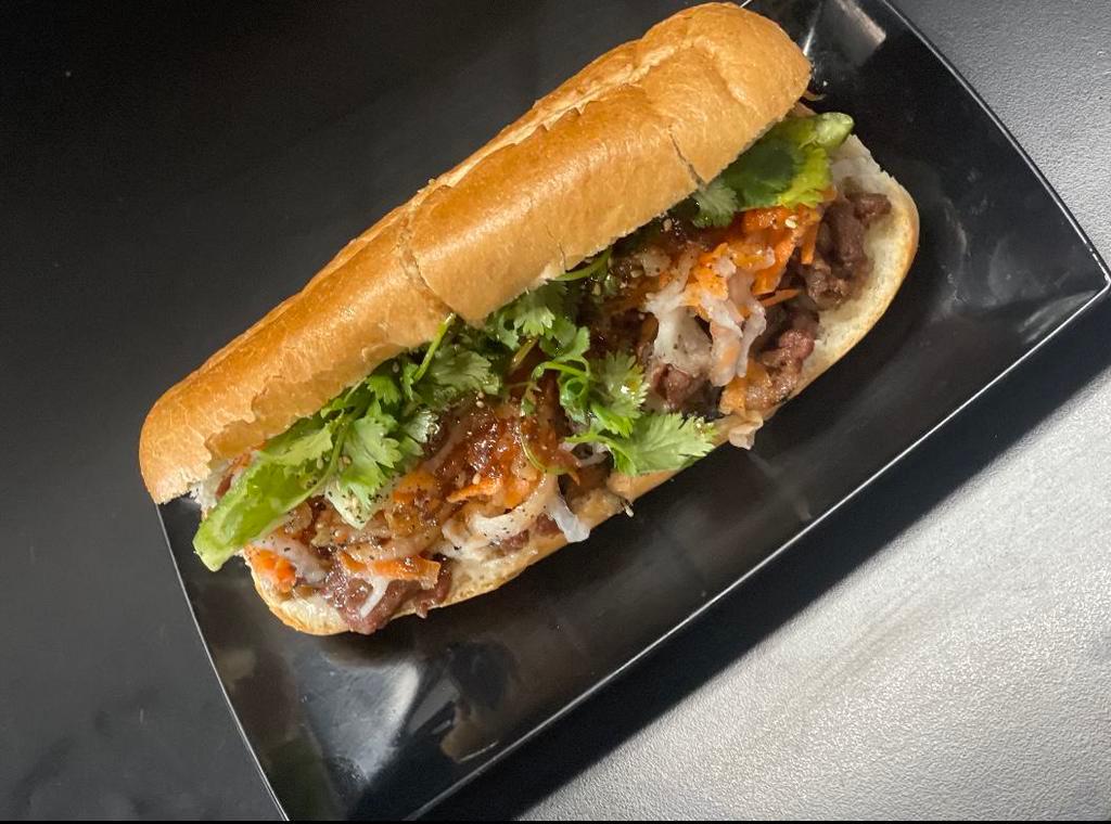 15. Lemongrass Pork Sandwich · Thick cut of meat from a pig typically cut from the spine.