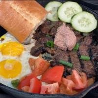 S6. Bo Ne  · Vietnamese steak and sunny side up eggs serve with tomato, cucumber, onions, pate and baguet...