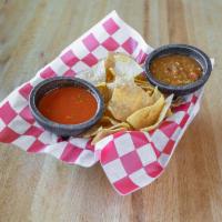 Bottomless  Salsa and Homemade Chips · Salsa rojo or salsa verde and chips.