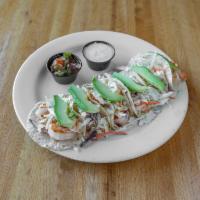 Shrimp Tacos · 3 corn or flour tortillas filled with shrimp grilled to perfection, fresh cabbage, carameliz...