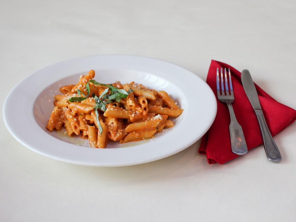 Penne alla Vodka · Tomato cream sauce with a touch of vodka. Add chicken for an additional charge.