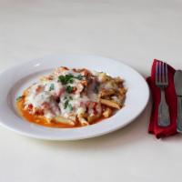 Baked Ziti Dish · Cooked in an oven. Smooth tube shaped pasta.