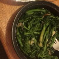 Sauteed Broccoli Rabe · Rapini. Green cruciferous vegetable. Cooked in oil or fat over heat.