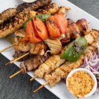 Small mix Grill Platter · 2 chicken skewers,2pork skewers,2 beef skewers,2 kotobiftekia skewers,2chicken bacon skewers...