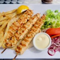 Chicken Skewers Platter · Cubed marinated chicken skewers (3).All platters served with Tzatziki sauce or Niko's sauce,...