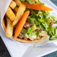 Chicken Bacon Skewer Pita · Wrapped bacon on marinated chunk of chicken, tomatoes, lettuce, fries, and Niko's sauce.