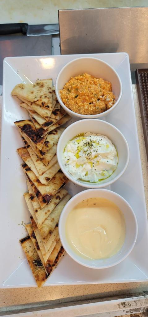 Combo of 3 Spreads · Served with pita bread.