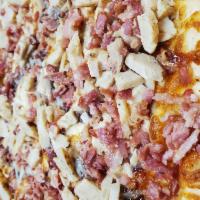 Rancher Pizza · Grilled chicken, bacon, and BBQ sauce drizzled with ranch.