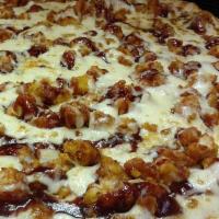 BBQ Chicken and Blue Cheese Pizza · Fried BBQ chicken, BBQ sauce, blue cheese and mozzarella.