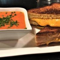 Grilled Cheese Sandwich and Tomato Soup · Texas toast, cheddar, American cheese, creamy tomato soup and chives. Add chopped bacon for ...