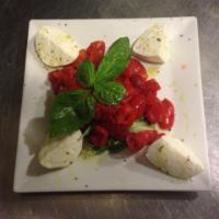 Fior di Latte Salad · Fresh mozzarella, tomato, basil, and roasted peppers.
