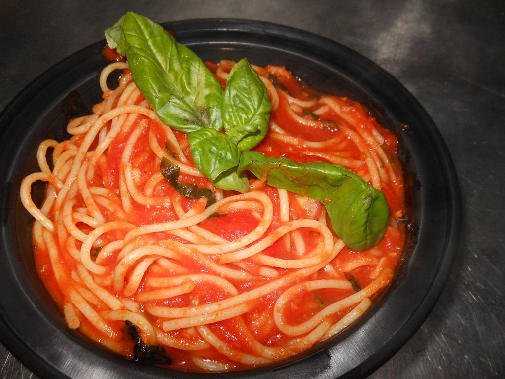 Spaghetti al Pomodoro · Spaghetti tossed with fresh tomato sauce and basil. 