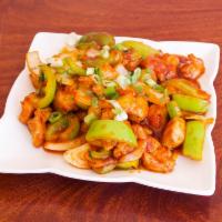 Chilly Chicken · Deep fried battered tender juicy chicken breast, onions and bell peppers stir fried in chill...