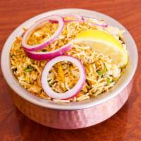 Chicken Biryani 28 Oz · Basmati rice saffron and Indian spices cooked with boneless chicken.