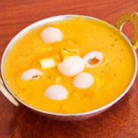 Lychee Paneer Korma · Lychee fruit cooked with Homemade cottage cheese in a tomato onion cream sauce, 16 Oz