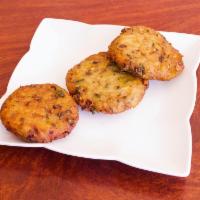 Aloo Tikki · Crispy deep fried spiced potato patty.