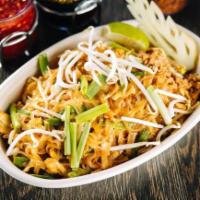 9. Pad Thai · Thin rice noodles, egg, bean sprouts, green onions, crushed peanuts, lime wedge