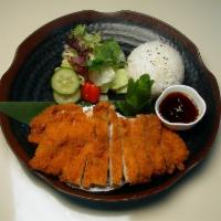 Chicken Katsu · Panko breaded chicken served with salad and rice.