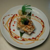 Baked Scallop Roll · Baked scallop on top of California roll.