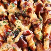 Hickory Fries · Fries loaded up with pulled pork, BBQ sauce and cheese.
