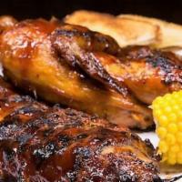 Chicken and Rib Combo Plate ·  ribs and 1/4 chicken served with choice of 2 sides and bread.