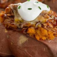 Stuffed Spud · Oversized baked potato stuffed with choice of meat, cheese and Bub-a-rub.