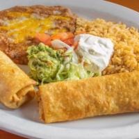 Flautas Plate · Served with rice and beans, sour cream, guacamole on the side.