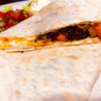 Vegetarian Quesadilla · Black beans, portabella mushrooms and sweet potato. Served with a side of pico de gallo and ...