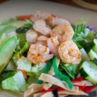 Shrimp Salad · Grilled seasoned shrimp, fresh romaine salad, avocados, sliced tomatoes, parmesan cheese, cr...