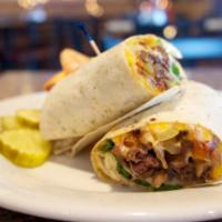 Philly Cheese Steak Wrap · Fresh steak, onions, tomatoes, lettuce, and American cheese.
