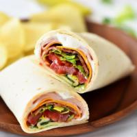 Turkey Wrap · Fresh turkey, provolone, tomatoes, lettuce, onions, and mayonnaise.