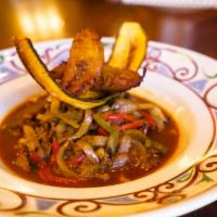 Ropa Vieja · Braised, shredded and stewed beef brisket,
tomatoes, bell peppers, onions, red wine,
white r...