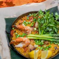 Paella Mixta · Traditional combination of shrimp, chicken, Cortez chorizo, smoked ham, green peas, saffron ...